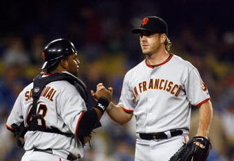 LOS ANGELES, CA - MAY 08:  Pitcher Brian Wilson (L) #38 of the San Francisco Giants is congratulated by catcher Pablo Sandoval #48 after saving the game against the Los Angeles Dodgers at Dodger Stadium on May 8, 2009 in Los Angeles, California. The Giants defeated the Dodgers 3-1.  (Photo by Jeff Gross/Getty Images)