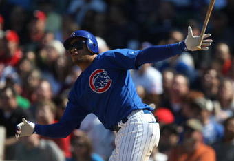 CHICAGO - APRIL 17: Aramis Ramirez #16 of the Chicago Cubs hits an RBI double in the 5th inning against the St. Louis Cardinals on April 17, 2009 at Wrigley Field in Chicago, Illinois. The Cubs defeated the Cardinals 8-7. (Photo by Jonathan Daniel/Getty Images)