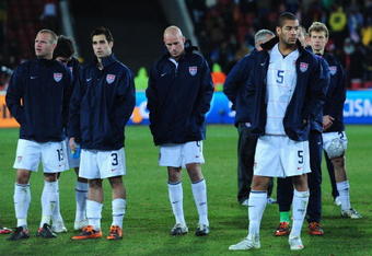 JOHANNESBURG, SOUTH AFRICA - JUNE 28:  Oguchi Onyewu (R) of USA and his team mates show their dejection at the end of the FIFA Confederations Cup Final between USA and Brazil at the Ellis Park Stadium on June 28, 2009 in Johannesburg, South Africa.  (Photo by Laurence Griffiths/Getty Images)