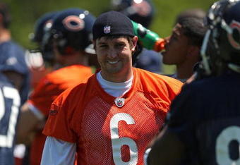 LAKE FOREST, IL - MAY 20: Jay Cutler #6 of the Chicago Bears smiles at a teammate during an organized team activity (OTA) practice on May 20, 2009 at Halas Hall in Lake Forest, Illinois. (Photo by Jonathan Daniel/Getty Images)