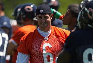 LAKE FOREST, IL - MAY 20: Jay Cutler #6 of the Chicago Bears smiles at a teammate during an organized team activity (OTA) practice on May 20, 2009 at Halas Hall in Lake Forest, Illinois. (Photo by Jonathan Daniel/Getty Images)