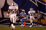 SAN DIEGO - DECEMBER 04:  Wide Receiver Vincent Jackson #83 of the San Diego Chargers reaches to catch the ball during their NFL Game against the Oakland Raiders on December 4, 2008 at Qualcomm Stadium in San Diego, California.  (Photo by Harry How/Getty Images)