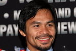 HOLLYWOOD - MARCH 30:  Professional boxer Manny Pacquiao attends 'The Battle of East and West', a promotion for the May 2, 2009 World Junior Welterweight Championship boxing match held at the Roosevelt Hotel on March 30, 2009 in Hollywood, California.  (Photo by Alberto E. Rodriguez/Getty Images)