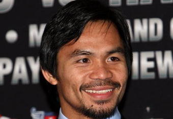 HOLLYWOOD - MARCH 30:  Professional boxer Manny Pacquiao attends 'The Battle of East and West', a promotion for the May 2, 2009 World Junior Welterweight Championship boxing match held at the Roosevelt Hotel on March 30, 2009 in Hollywood, California.  (Photo by Alberto E. Rodriguez/Getty Images)