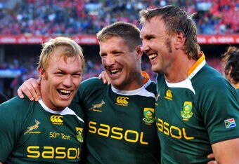 PRETORIA, SOUTH AFRICA - JUNE 27:  (L-R) Schalk Burger, Bakkies Botha and Andries Bekker of South Africa celebrate their series win after the Second Test match between South Africa and the British and Irish Lions at Loftus Versfeld on June 27, 2009 in Pretoria, South Africa.  (Photo by Duif du Toit/Gallo Images/Getty Images)