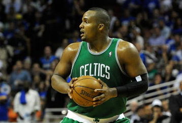 ORLANDO, FL - MAY 14:  Glen Davis #11 of the Boston Celtics looks to pass against the Orlando Magic in Game Six of the Eastern Conference Semifinals during the 2009 NBA Playoffs at Amway Arena on May 14, 2009 in Orlando, Florida.  NOTE TO USER: User expressly acknowledges and agrees that, by downloading and/or using this Photograph, user is consenting to the terms and conditions of the Getty Images License Agreement.  (Photo by Sam Greenwood/Getty Images)