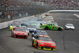 LOUDON, NH - JUNE 28: Jeff Gordon, driver of the #24 DuPont Chevrolet, leads the field as Martin Truex Jr., driver of the #1 TomTom Chevrolet, loses control and hits wall during the NASCAR Sprint Cup Series LENOX Industrial Tools 301 at New Hampshire Motor Speedway on June 28, 2009 in Loudon, New Hampshire. (Photo by Chris Graythen/Getty Images)