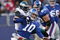 EAST RUTHERFORD, NJ - DECEMBER 07:  Eli Manning #10 of the New York Giants is tackled by Darren Howard #90 and Trent Cole #58 of the Philadelphia Eagles at Giants Stadium on December 7, 2008 in East Rutherford, New Jersey.  (Photo by Nick Laham/Getty Images)