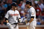 ARLINGTON, TX - JUNE 18:  Jeff Keppinger #28 and Lacnce Berkman #17 of the Houston Astros celebrate a run against the Texas Rangers in the 6th inning on June 18, 2009 at Rangers Ballpark in Arlington, Texas.  (Photo by Ronald Martinez/Getty Images)