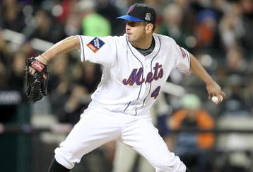 NEW YORK - APRIL 15:  Oliver Perez of the New York Mets pitches to the San Diego Padres on April 15, 2009 at Citi Field in the Flushing neighborhood of the Queens borough of New York City.   All Major League Baseball players are wearing #42 in honor of Jackie Robinson day.  (Photo by Ezra Shaw/Getty Images)