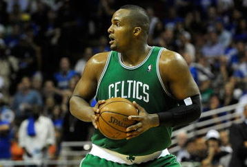 ORLANDO, FL - MAY 14:  Glen Davis #11 of the Boston Celtics looks to pass against the Orlando Magic in Game Six of the Eastern Conference Semifinals during the 2009 NBA Playoffs at Amway Arena on May 14, 2009 in Orlando, Florida.  NOTE TO USER: User expressly acknowledges and agrees that, by downloading and/or using this Photograph, user is consenting to the terms and conditions of the Getty Images License Agreement.  (Photo by Sam Greenwood/Getty Images)