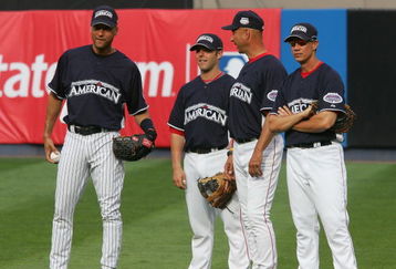 BRONX, NY - JULY 14:  (L-R) Derek Jeter of the New York Yankees, Dustin Pedroia, Terry Francona and an unidentified member of the Boston Red Sox speak in the outfield during batting practice for the 2008 MLB All-Star game at Yankee Stadium on July 14, 2008 in the Bronx, New York. (Photo by Jim McIsaac/Getty Images)