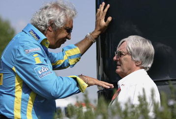 IMOLA, ITALY - APRIL 21:  F1 Supremo Bernie Ecclestone talks to Renalut team principal Flavio Briatore in the paddock during the second session prior to the San Marino Formula One Grand Prix at the San Marino Circuit on April 21, 2006, in Imola, Italy.  (Photo by Paul Gilham/Getty Images)