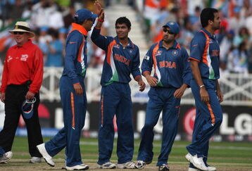 NOTTINGHAM, ENGLAND - JUNE 16:  Ravindra Jadeja of India is congratulated by his team mates after taking the wicket of  AB de Villiers of South Africa during the ICC World Twenty20 Super Eights match between South Africa and India at Trent Bridge on June 16, 2009 in Nottingham, England. (Photo by Julian Finney/Getty Images)