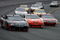 LOUDON, NH - JUNE 28:  David Stremme, driver of the #12 Penske Dodge, races Joey Logano, driver of the #20 Home Depot Toyota, and Reed Sorenson, driver of the #43 McDonald's McCafe Dodge, during the NASCAR Sprint Cup Series LENOX Industrial Tools 301 at New Hampshire Motor Speedway on June 28, 2009 in Loudon, New Hampshire.  (Photo by Chris Trotman/Getty Images)