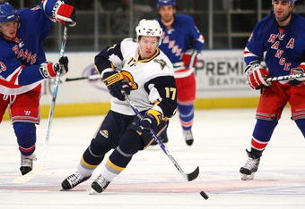 NEW YORK - MARCH 21:  Dominic Moore #17 of the Buffalo Sabres skates against the New York Rangers during the game on March 21, 2009 at Madison Square Garden in New York City.  (Photo by Chris McGrath/Getty Images)
