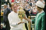 Jul 1968:  Rod Laver of Australia is handed the Wimbledon mens singles trophy by Queen Elizabeth II after winning the title at the all England club in London.                                                    Mandatory Credit: Allsport UK