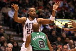 EAST RUTHERFORD, NJ - MARCH 04:  Jarvis Hayes #22 of the New Jersey Nets passes the ball against Stephon Marbury #8 of the Boston Celtics during their game on March 4, 2009 at The Izod Center in East Rutherford, New Jersey.  NOTE TO USER: User expressly acknowledges and agrees that, by downloading and/or using this Photograph, user is consenting to the terms and conditions of the Getty Images License Agreement.  (Photo by Al Bello/Getty Images)