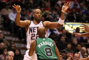 EAST RUTHERFORD, NJ - MARCH 04:  Jarvis Hayes #22 of the New Jersey Nets passes the ball against Stephon Marbury #8 of the Boston Celtics during their game on March 4, 2009 at The Izod Center in East Rutherford, New Jersey.  NOTE TO USER: User expressly acknowledges and agrees that, by downloading and/or using this Photograph, user is consenting to the terms and conditions of the Getty Images License Agreement.  (Photo by Al Bello/Getty Images)
