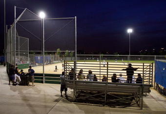 SAN BERNARDINO, CA - MAY 14:  Residents attend a peewee baseball game south of the San Andreas Rift Zone, the system of depressions in the ground between the parallel faults of the San Andreas earthquake fault, which runs along the northern edge of the city, May 14, 2008 in San Bernardino, California. New calculations reveal a 99.7 percent chance that a magnitude 6.7 quake or larger will strike by 2037, according to the first-ever statewide temblor forecast released by the scientists of the United States Geological (USGS), Southern California Earthquake Center and California Geological Survey last month. Scientists have particular concern for the people living along the southern portion of the 800-mile-long San Andreas Fault east of Los Angeles. This section of the fault has had very little slippage for more than 300 years and has built up immense pressure that could release an earthquake of historic proportions at any time. Such a quake could produce a sudden lateral movement of 23 to 32 feet and be would be