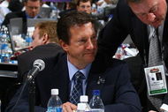 OTTAWA, ON - JUNE 21: Steve Tambellini and Mike Gillis of the Vancouver Canucks photographed during the 2008 NHL Entry Draft at Scotiabank Place on June 21, 2008 in Ottawa, Ontario, Canada. (Photo by Bruce Bennett/Getty Images)