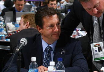 OTTAWA, ON - JUNE 21: Steve Tambellini and Mike Gillis of the Vancouver Canucks photographed during the 2008 NHL Entry Draft at Scotiabank Place on June 21, 2008 in Ottawa, Ontario, Canada. (Photo by Bruce Bennett/Getty Images)