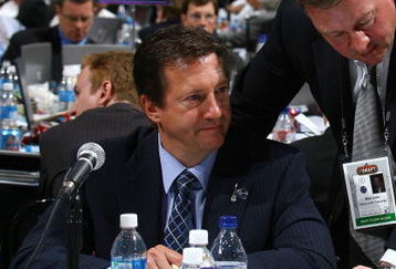 OTTAWA, ON - JUNE 21: Steve Tambellini and Mike Gillis of the Vancouver Canucks photographed during the 2008 NHL Entry Draft at Scotiabank Place on June 21, 2008 in Ottawa, Ontario, Canada. (Photo by Bruce Bennett/Getty Images)
