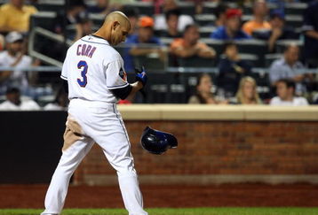 NEW YORK - JUNE 28:  Alex Cora #3 of the New York Mets throws his helmet after striking out against the New York Yankees on June 28, 2009 at Citi Field in the Flushing neighborhood of the Queens borough of New York City. The Yankees defeated the Mets 4-2.  (Photo by Jim McIsaac/Getty Images)