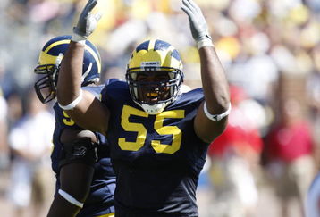 ANN ARBOR, MI - SEPTEMBER 6:  Defensive end Brandon Graham #55 of the Michigan Wolverines raises his arms during the game against the Miami of Ohio Red Hawks on September 6, 2008 at Michigan Stadium in Ann Arbor, Michigan.  The Wolverines defeated the Red Hawks 16-6. (Photo by Gregory Shamus/Getty Images)