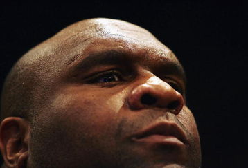 LONDON - FEBRUARY 10: Robert Malcolm Sapp also known as Bob The Beast Sapp eyes off a potential challenger during the Cage Rage Championship 20 Born to fight event at Wembley Arena on February 10, 2007 in London, England. Cage Fighting also known as MMA, Mixed Martial Arts is a mixed fighting style combat sport with a steadily growing international fan base. MMA is an evolving combat sport where competitors combine different disciplines that include jiu-jitsu, judo, karate, boxing, kickboxing, wrestling and others to their strategic and tactical advantage in a competetive arena.  (Photo by Daniel Berehulak/Getty Images)