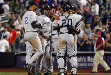 NEW YORK - JUNE 28: Mariano Rivera #42 of the New York Yankees hugs teammate Jorge Posada #20 after the final out against the New York Mets on June 28, 2009 at Citi Field in the Flushing neighborhood of the Queens borough of New York City. (Photo by Jim McIsaac/Getty Images)