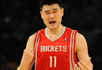 LOS ANGELES, CA - MAY 06:  Yao Ming #11 of the Houston Rockets reacts to a foul called on him in the second quarter against the Los Angeles Lakers in Game Two of the Western Conference Semifinals during the 2009 NBA Playoffs at Staples Center on May 6, 2009 in Los Angeles, California. NOTE TO USER: User expressly acknowledges and agrees that, by downloading and or using this photograph, User is consenting to the terms and conditions of the Getty Images License Agreement.  (Photo by Harry How/Getty Images)