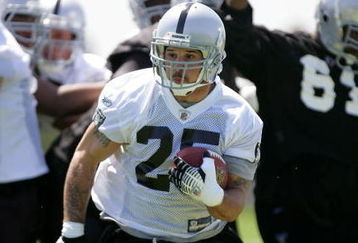 ALAMEDA, CA - MAY 08:  Justin Fargas #25 of the Oakland Raiders runs with the ball during the Raiders minicamp at the team's permanent training facility on May 8, 2009 in Alameda, California.  (Photo by Ezra Shaw/Getty Images)
