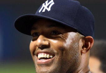 NEW YORK - JUNE 28: Mariano Rivera #42 of the New York Yankees celebrates after earning his 500th career save against the New York Mets on June 28, 2009 at Citi Field in the Flushing neighborhood of the Queens borough of New York City. (Photo by Jim McIsaac/Getty Images)