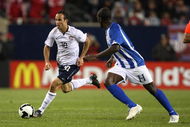 CHICAGO - JUNE 06: Landon Donovan #10 of the United States moves against Hendry Thomas #4 of Honduras during a FIFA 2010 World Cup Qualifying match on June 6, 2009 at Soldier Field in Chicago, Illinois. The United States defeated Honduras 2-1. (Photo by Jonathan Daniel/Getty Images)