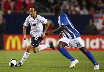 CHICAGO - JUNE 06: Landon Donovan #10 of the United States moves against Hendry Thomas #4 of Honduras during a FIFA 2010 World Cup Qualifying match on June 6, 2009 at Soldier Field in Chicago, Illinois. The United States defeated Honduras 2-1. (Photo by Jonathan Daniel/Getty Images)