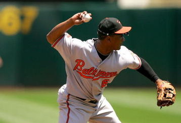 OAKLAND, CA - JUNE 07:  Melvin Mora #6 of the Baltimore Orioles throws to first base during their game against the Oakland Athletics at the Oakland Coliseum on June 7, 2009 in Oakland, California.  (Photo by Ezra Shaw/Getty Images)