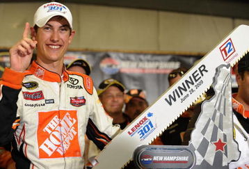 LOUDON, NH - JUNE 28:  Joey Logano, driver of the #20 Home Depot Toyota, celebrates winning the NASCAR Sprint Cup Series LENOX Industrial Tools 301 at New Hampshire Motor Speedway on June 28, 2009 in Loudon, New Hampshire. Logano won the rain shortened race with 27 laps remaining.  (Photo by Drew Hallowell/Getty Images for NASCAR)