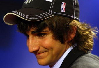 NEW YORK - JUNE 25:  Fifth overall draft pick by the Minnesota Timberwolves,  Ricky Rubio makes his way to the stage during the 2009 NBA Draft at the Wamu Theatre at Madison Square Garden June 25, 2009 in New York City. NOTE TO USER: User expressly acknowledges and agrees that, by downloading and/or using this Photograph, User is consenting to the terms and conditions of the Getty Images License Agreement.  (Photo by Jim McIsaac/Getty Images)