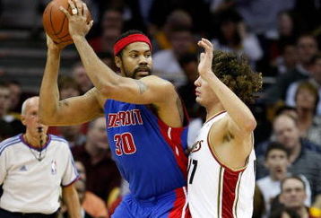 CLEVELAND - APRIL 21:  Rasheed Wallace #30 of the Detroit Pistons goes up against Anderson Varejao #17 of the Cleveland Cavaliers in Game Two of the Eastern Conference Quarterfinals during the 2009 NBA Playoffs at Quicken Loans Arena on April 21, 2009 in Cleveland, Ohio.  The Cavaliers won 94-82.  NOTE TO USER: User expressly acknowledges and agrees that, by downloading and or using this photograph, User is consenting to the terms and conditions of the Getty Images License Agreement.  (Photo by Gregory Shamus/Getty Images)