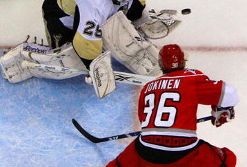 RALEIGH, NC - MAY 26:  Goaltender Marc-Andre Fleury #29 of the Pittsburgh Penguins saves a shot on goal by Jussi Jokinen #36 of the Carolina Hurricanes during Game Four of the Eastern Conference Championship Round of the 2009 Stanley Cup Playoffs at RBC Center on May 26, 2009 in Raleigh, North Carolina.  (Photo by Jim McIsaac/Getty Images)