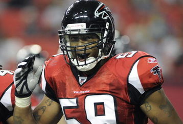 ATLANTA - AUGUST 22: Linebacker Michael Boley #59 of the Atlanta Falcons sets on defense against the Tennessee Titans at the Georgia Dome on August 22, 2008 in Atlanta, Georgia.  (Photo by Al Messerschmidt/Getty Images) 