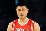 LOS ANGELES, CA - MAY 06:  Yao Ming #11 of the Houston Rockets reacts to a foul called on him in the second quarter against the Los Angeles Lakers in Game Two of the Western Conference Semifinals during the 2009 NBA Playoffs at Staples Center on May 6, 2009 in Los Angeles, California. NOTE TO USER: User expressly acknowledges and agrees that, by downloading and or using this photograph, User is consenting to the terms and conditions of the Getty Images License Agreement.  (Photo by Harry How/Getty Images)