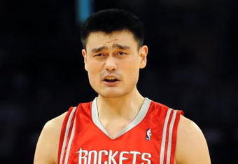 LOS ANGELES, CA - MAY 06:  Yao Ming #11 of the Houston Rockets reacts to a foul called on him in the second quarter against the Los Angeles Lakers in Game Two of the Western Conference Semifinals during the 2009 NBA Playoffs at Staples Center on May 6, 2009 in Los Angeles, California. NOTE TO USER: User expressly acknowledges and agrees that, by downloading and or using this photograph, User is consenting to the terms and conditions of the Getty Images License Agreement.  (Photo by Harry How/Getty Images)