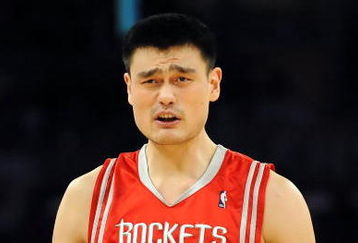 LOS ANGELES, CA - MAY 06:  Yao Ming #11 of the Houston Rockets reacts to a foul called on him in the second quarter against the Los Angeles Lakers in Game Two of the Western Conference Semifinals during the 2009 NBA Playoffs at Staples Center on May 6, 2009 in Los Angeles, California. NOTE TO USER: User expressly acknowledges and agrees that, by downloading and or using this photograph, User is consenting to the terms and conditions of the Getty Images License Agreement.  (Photo by Harry How/Getty Images)