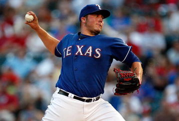 ARLINGTON, TX - JUNE 28:  Pitcher Tommy Hunter #35 of the Texas Rangers throws against the San Diego Padres on June 28, 2009 at Rangers Ballpark in Arlington, Texas.  (Photo by Ronald Martinez/Getty Images)