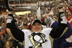 DETROIT - JUNE 12: Ruslan Fedotenko #26 of the Pittsburgh Penguins celebrates with the Stanley Cup following the Penguins victory over the Detroit Red Wings in Game Seven of the 2009 NHL Stanley Cup Finals at Joe Louis Arena on June 12, 2009 in Detroit, Michigan. (Photo by Bruce Bennett/Getty Images)