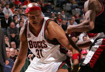 MILWAUKEE - MARCH 07: Charlie Villanueva #31 of the Milwaukee Bucks moves against James Jones #33 of the Portland Trail Blazers on March 7, 2008 at the Bradley Center in Milwaukee, Wisconsin. The Trail Blazers defeated the Bucks 103-101. NOTE TO USER: User expressly acknowledges and agreees that, by downloading and/or using this Photograph, User is consenting to the terms and conditions of the Getty Images License Agreement. (Photo by Jonathan Daniel/Getty Images)