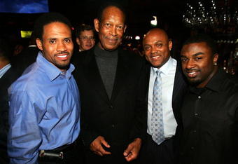 SCOTTSDALE, AZ - JANUARY 31:  (L-R) Keenan McCardell of the Washinton Redskins, Executive director of the National Football League Players Association Gene Upshaw, Brian Mitchell and Brian Westbrook of the Philadelphia Eagles pose for a photo during the NFL PLAYERS VIP Party prior to Super Bowl XLII at Barcelona Restaurant on January 31, 2008 in Scottsdale, Arizona.  (Photo by Streeter Lecka/Getty Images)