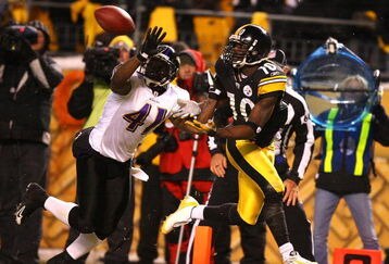 PITTSBURGH - JANUARY 18:  Santonio Holmes #10 of the Pittsburgh Steelers can't make the reception in the endzone as he is defended by Frank Walker #41 of the Baltimore Ravens during the AFC Championship game on January 18, 2009 at Heinz Field in Pittsburgh, Pennsylvania.  (Photo by Al Bello/Getty Images)